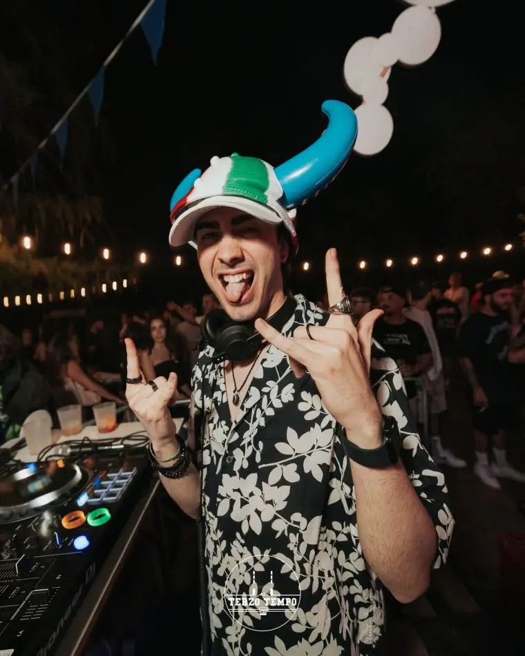 Michael De Leo playing a hard techno DJ set outdoors